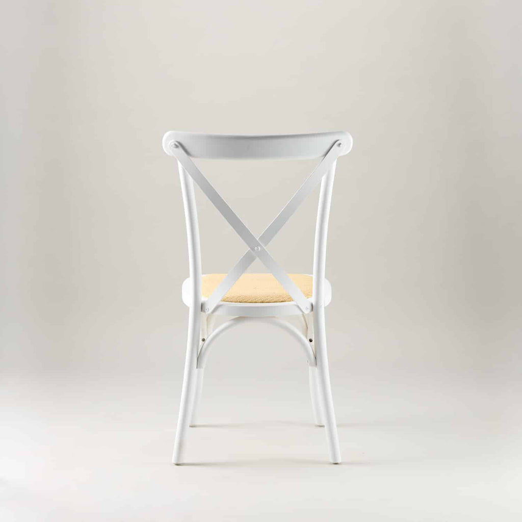 White crossback chair – rattan seat pad